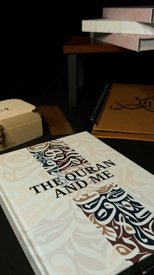 Book titled 'The Quran and Me' with decorative cover design on a dark surface.